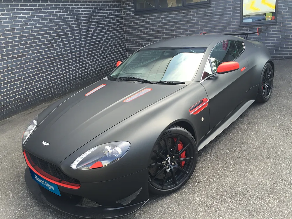 Full colour change in matte black and red, wrapped by the iBrand team in Warrington