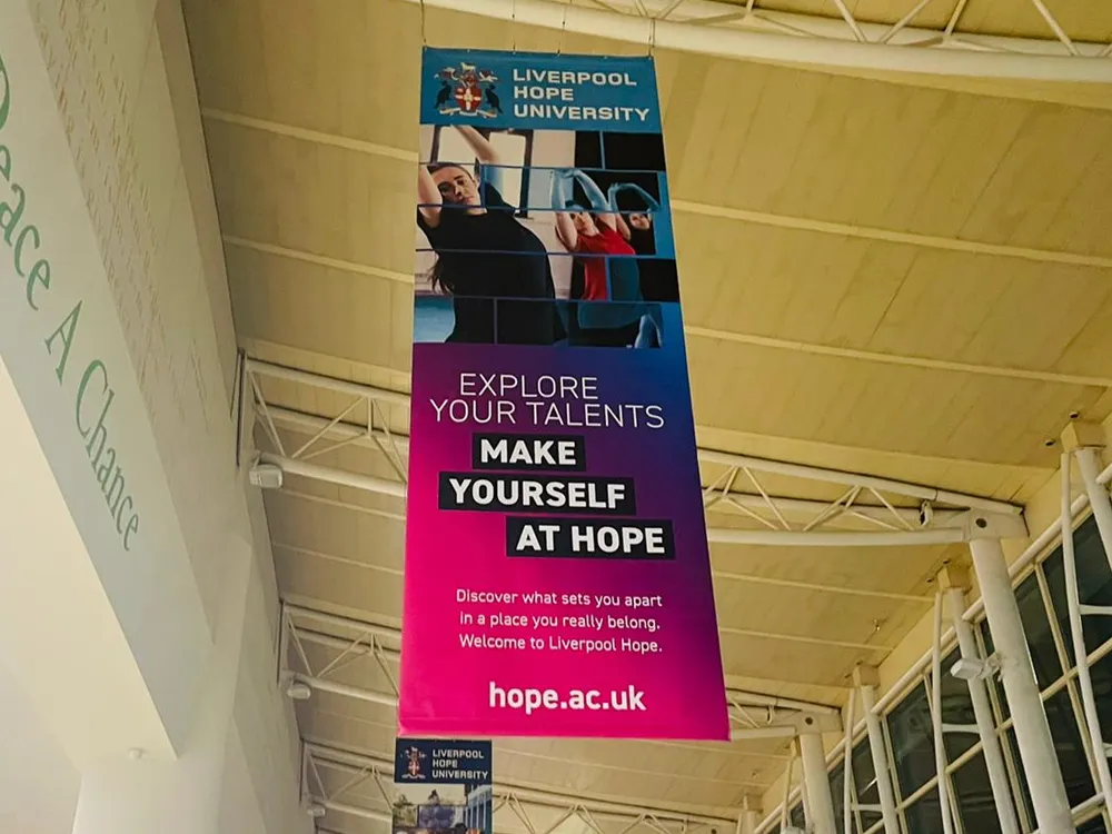 One of many hanging banners that we produced for Liverpool Hope University inside Liverpool Airport. Banners Warrington